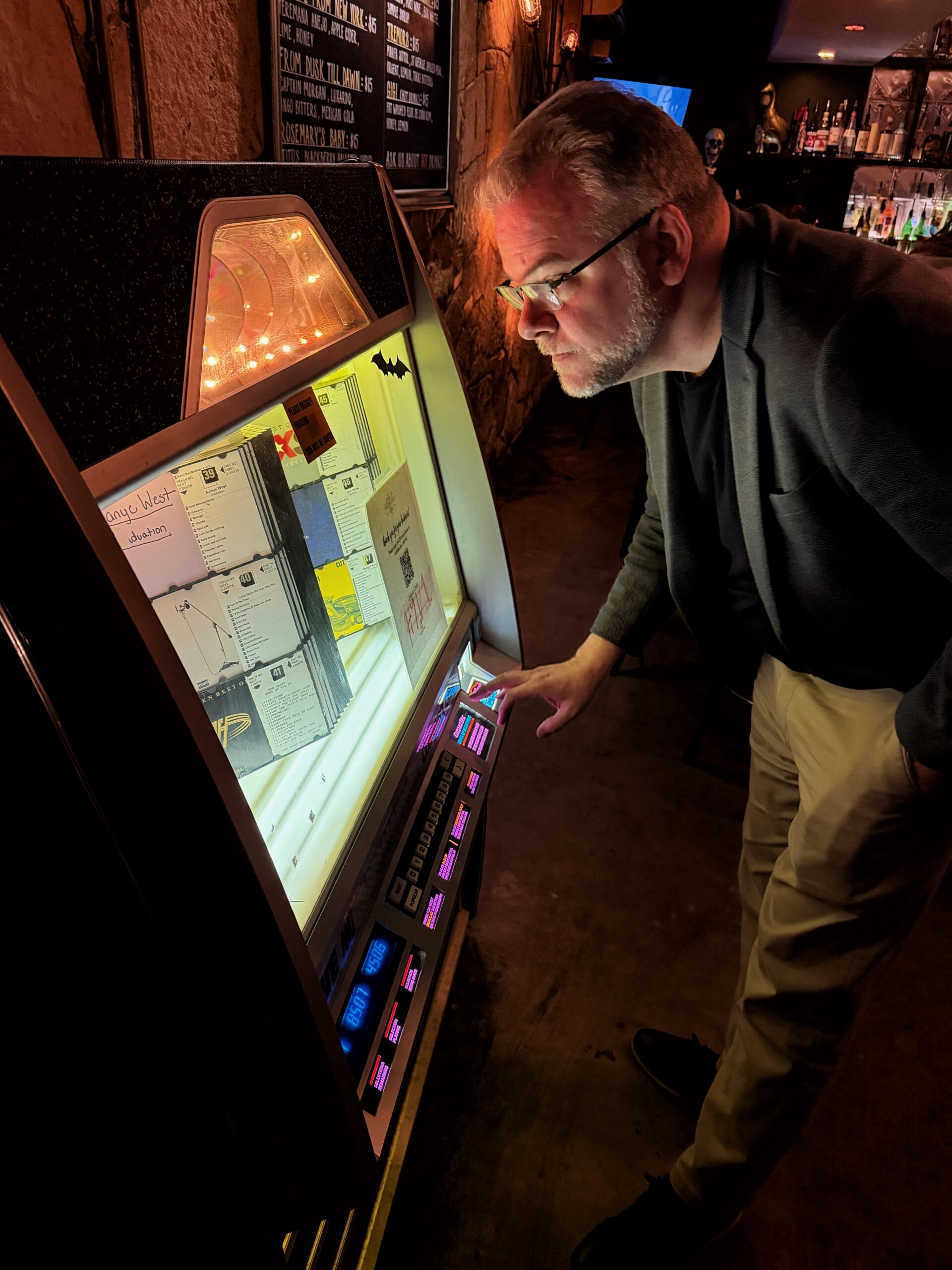 Jason Santo at a jukebox in Austin, Texas